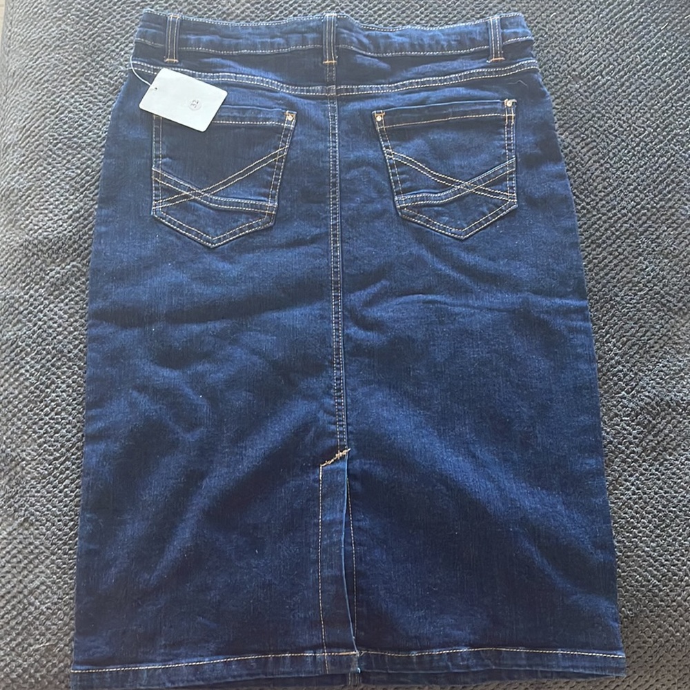 Denim skirt. Size 32. Just past knee.